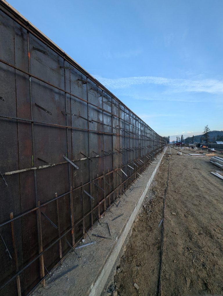 Long concrete retaining wall